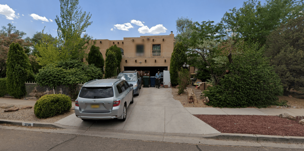 cars parked outside house